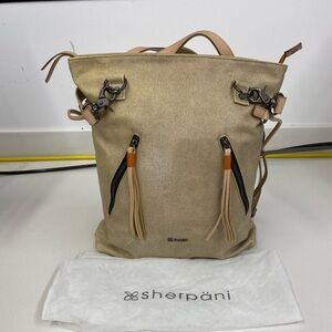Sherpani Beige Backpack with Tassel Accents
